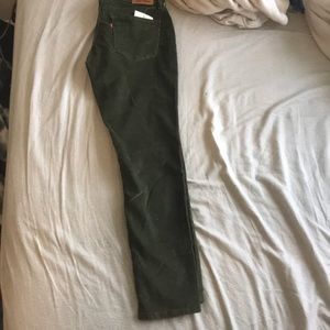 Green corduroy jeans